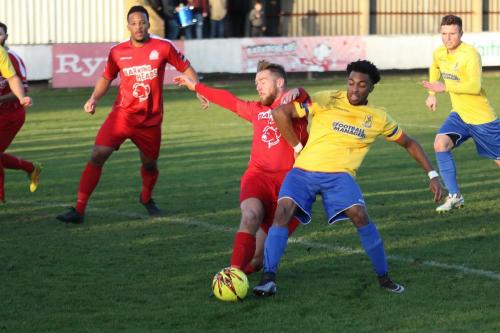 Harrows Steve Brown (red) challenges Dernell Wynter