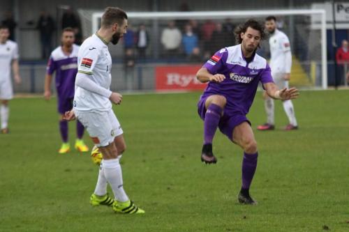 Enfields Harry Ottaway (R) misses an attempted interception