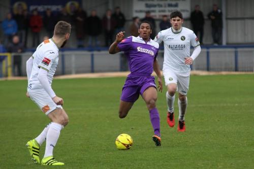 Enfields Jonathann Muleba and Havants Rory Williams (L) and Andreas Robinson