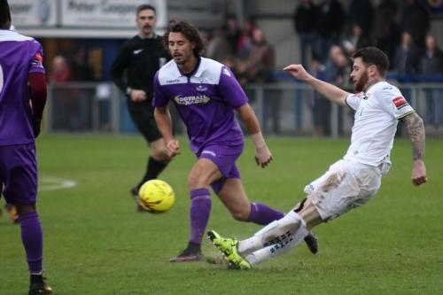 Havants Ryan Woodford gets his clearance away despite his standing foot slipping