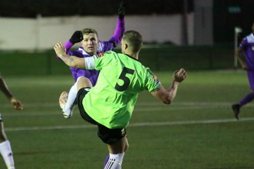 Enfields Billy Crook (purple) and Hendons Arthur Lee
