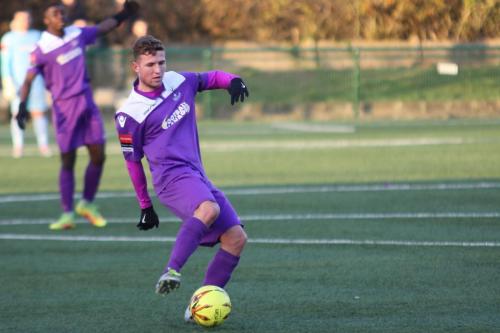 Enfields Billy Crook had a first half goal disallowed but later scored the equaliser from the penalty spot