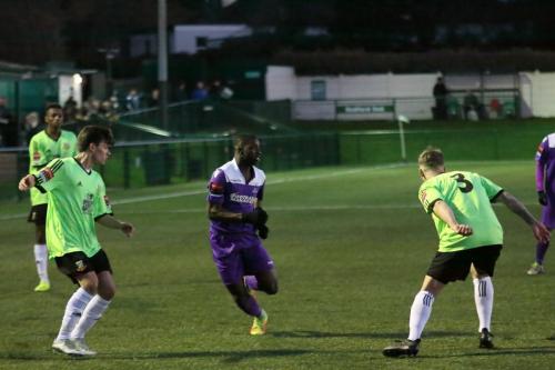 Enfields Percy Kiangebeni challenged by Sam Murphy (L) and Oliver Sprague