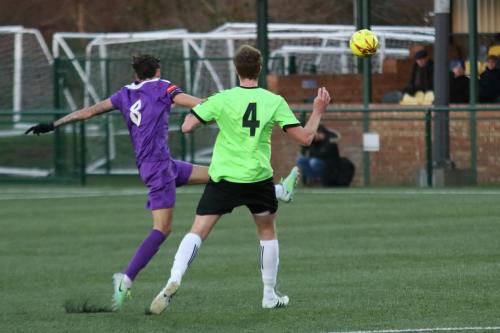 Enfields Tom Collins (L) and Hendons Bradley Hewitt