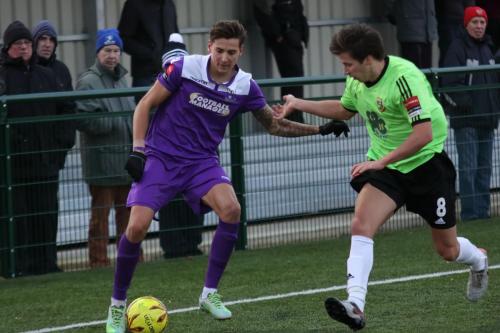 Enfields Tom Collins (L) and Hendons Spencer McCall