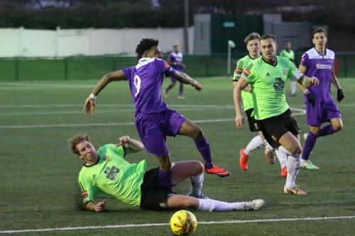 Hendons Bradley Hewitt (L) tackles Dernell Wynter
