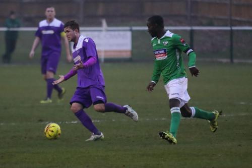 Enfields Billy Crook (L) and Leatherheads Paul Semakula