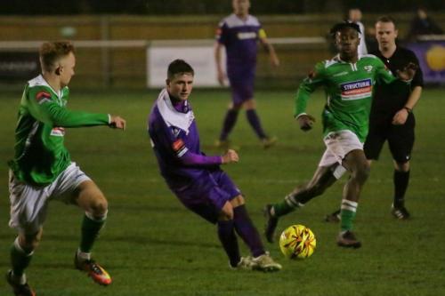 Enfields Billy Crook and Leatherheads Adam Cash (L) and Kadell Daniel