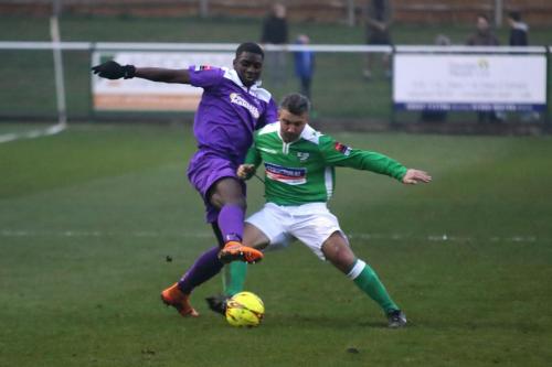 Enfields Percy Kiangebeni (L) and Leatherheads Danny Murphy