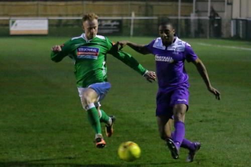 Enfields Ricky Gabriel (R) and Leatherheads Adam Cash