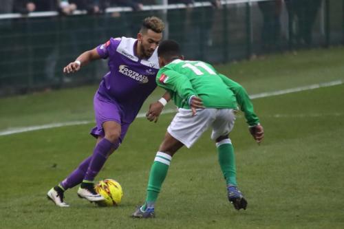 Enfields Tyler Campbell (L) and Leatherheads Mo Sagaf