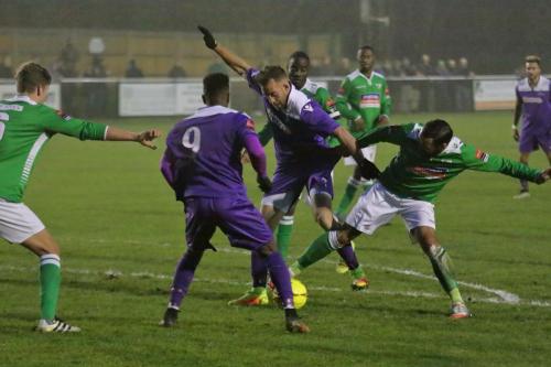 Leatherheads Ty Smith (R) holds off Scott Shulton