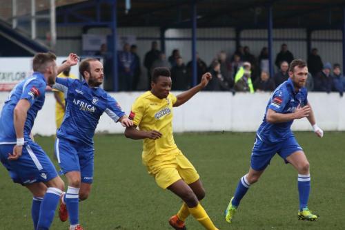 Enfields Karl Oliyide (yellow) and (L-R) Lowestofts Shaun Bammant, Andrew Fisk and Ryan Jarvis