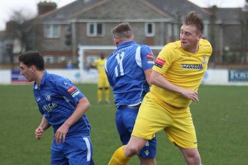 Lowestofts Travis Cole (L) and Shaun Bammant and Enfields Mark Kirby