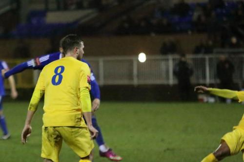 A perfect view of Lloyd Macklin scoring the second goal