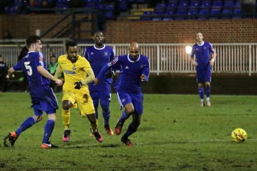 Enfields Bobby Devyne (yellow) tries to get between Olli Robinson (5) and Steve Sutherland