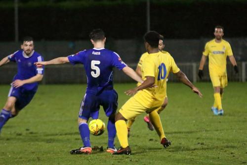 Enfields Lewis Wilson (10) challenges Olli Robinson