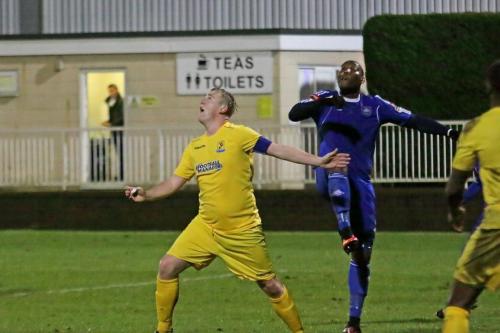 Enfields Mark Kirby (L) and Mets Rob Bartley