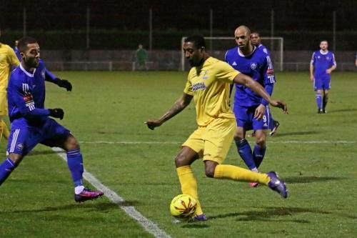 Enfields Ricky Gabriel and Mets Roman Michael-Percil (L) and Lloyd Macklin