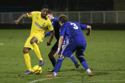 Enfields Ricky Gabriel tries to wriggle past Will Salmon (3) and Luke Robertson