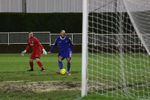 Lloyd Macklin opens the scoring after an error by keeper Nathan McDonald