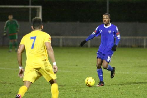 Mets Orlando Smith (R) runs at Tyler Campbell