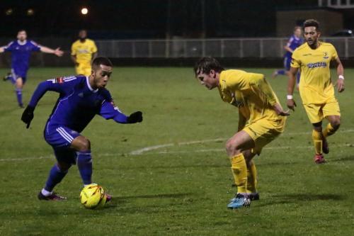 Mets Roman Michael-Percil (L) and Enfields Mickey Parcell