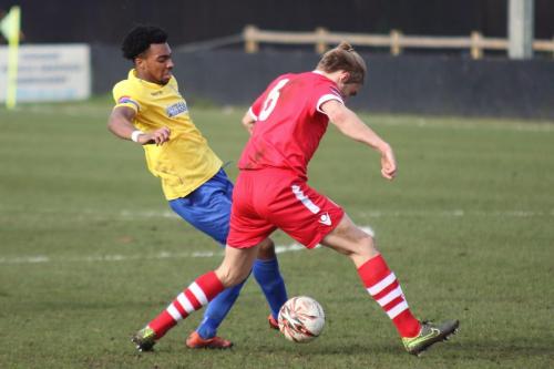 Enfields Dernell Wynter (yellow) and Needhams Keiran Morphew