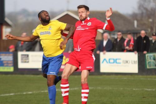 Enfields Harold Joseph (L) challenges Ian Miller922