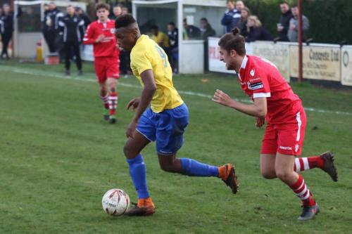 Enfields Karl Oliyide (yellow) and Needhams Will Crisell
