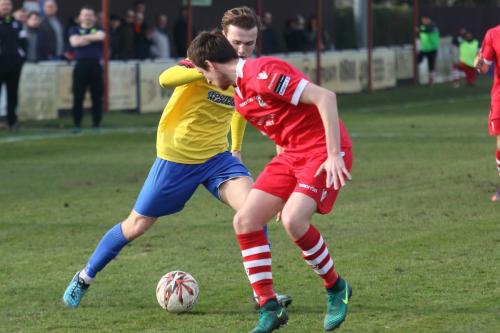 Enfields Mickey Parcell (yellow) and Needhams Daryl Coakley