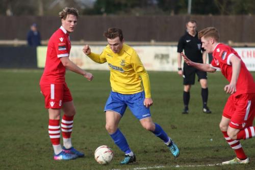 Enfields Mickey Parcell and Needhams Cameron Norman (L) and Billy Holland