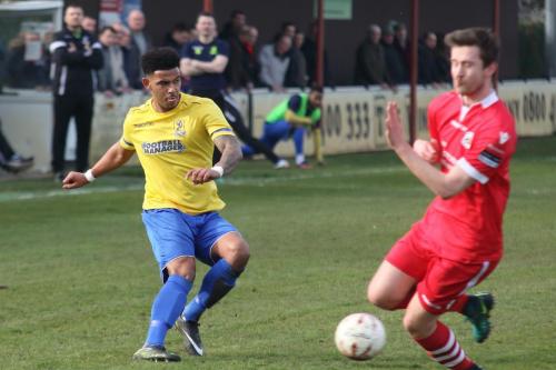 Enfields Nathan Livings (L) and Needhams  Daryl Coakley