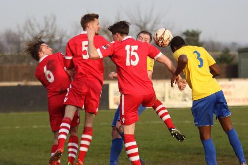 Enfields Ricky Gabriel (3) wins a header against Keiran Morphew (6), Ian Miller and Joe Whight (15)