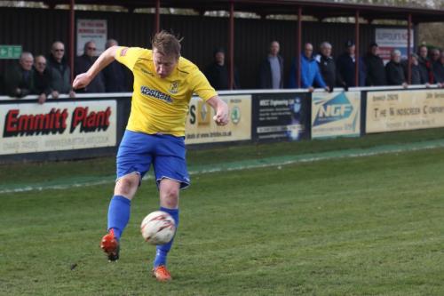 Mark Kirby crosses to set up the second Enfield goal
