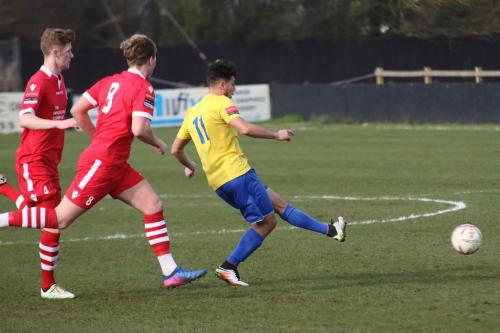 Needhams Billy Holland (L) and Cameron Norman chase Samir Bihmoutine