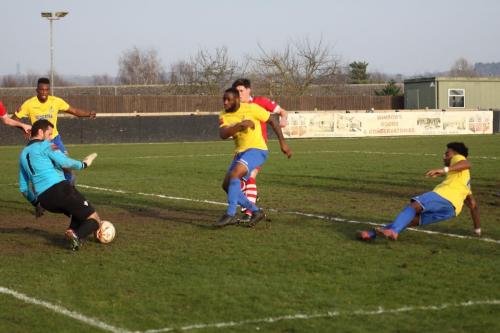 Needhams Danny Gay saves from (I think) Harold Joseph (yellow, centre)