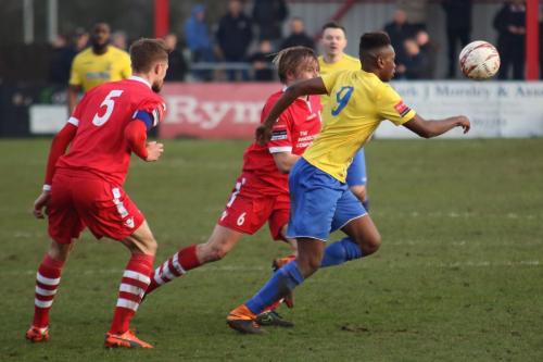 Needhams Ian Miller (5) and Keiran Morphew and Enfields Karl Oliyide