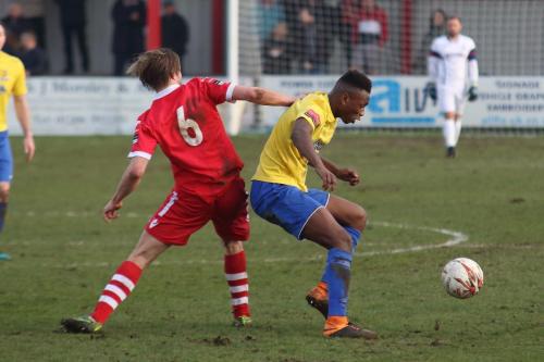 Needhams Keiran Morphew (L) and Enfields Karl Oliyide