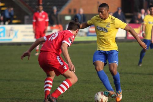 Needhams Will Crisell (L) and Enfields Jonathan Muleba