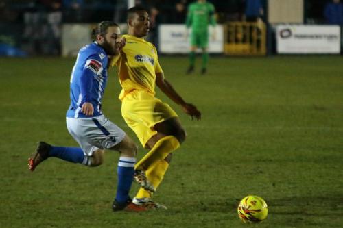 Angels Jack Parter (L) and Enfields Jonathan Muleba