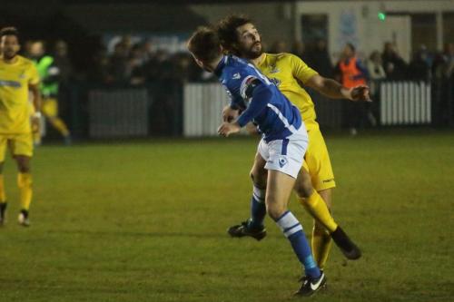 Angels Tom Parkinson (blue) and Enfields Harry Ottaway