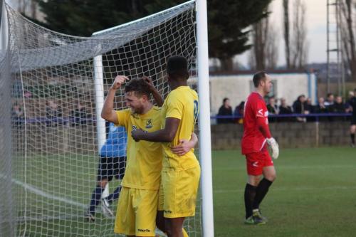 Billy Crook (L) and Karl Oliyide celebrate Crooks penalty, the 4th Enfield goal