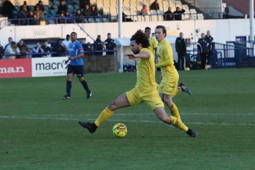 Enfields Harry Ottaway advances on the keeper before scoring his second goal