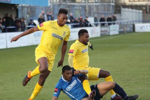 Enfields Karl Oliyide (L) and Bobby Devyne and Wingates Tanasheh Abrahams