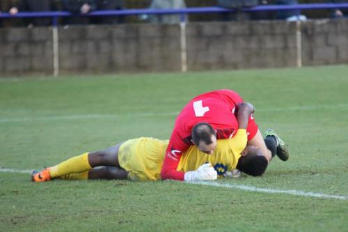 Enfields Karl Oliyide (yellow) and Wingates Shane Gor