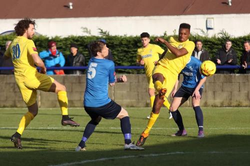 Enfields Karl Oliyide shoots into the side netting
