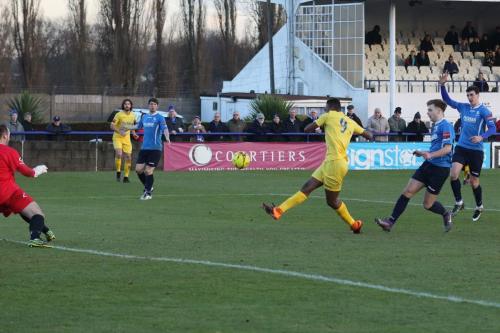 Enfields Karl Oliyide shoots over the bar