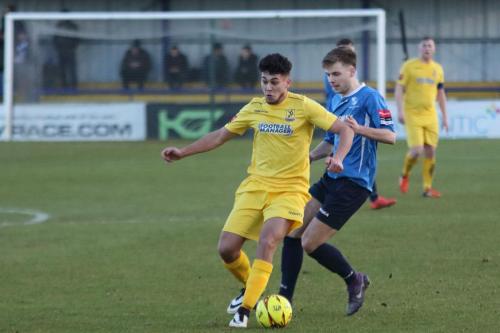 Enfields Samir Bihmoutine (L) and Wingates Alfie Young