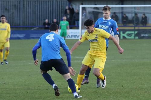 Enfields Samir Bihmoutine (R) and Wingates Claudiu Vilcu